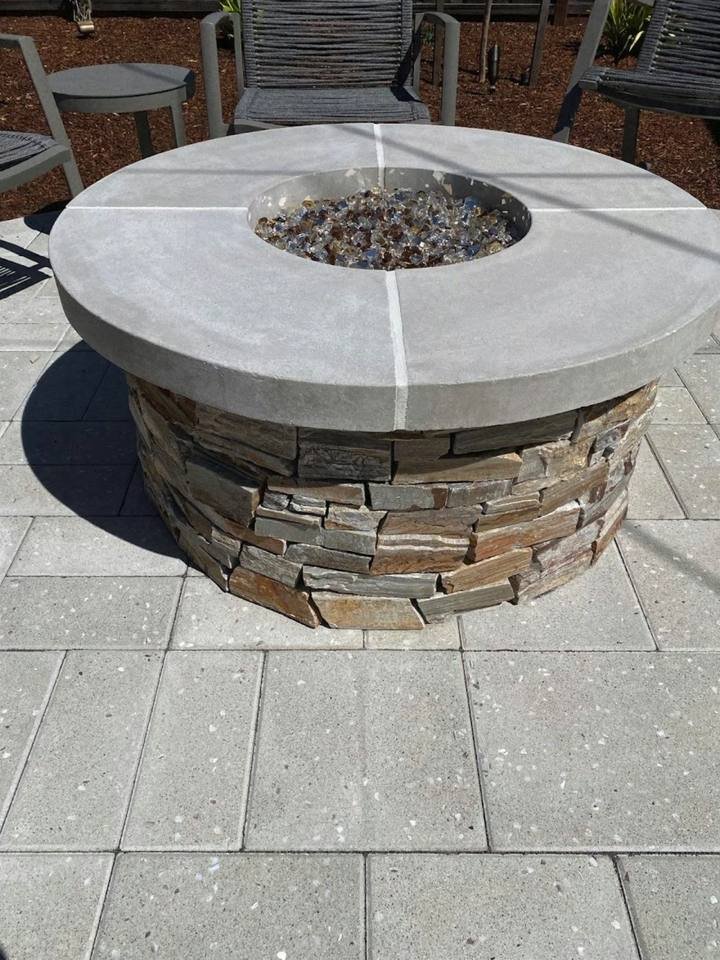 Flagstone patio with fire bowl and seating
