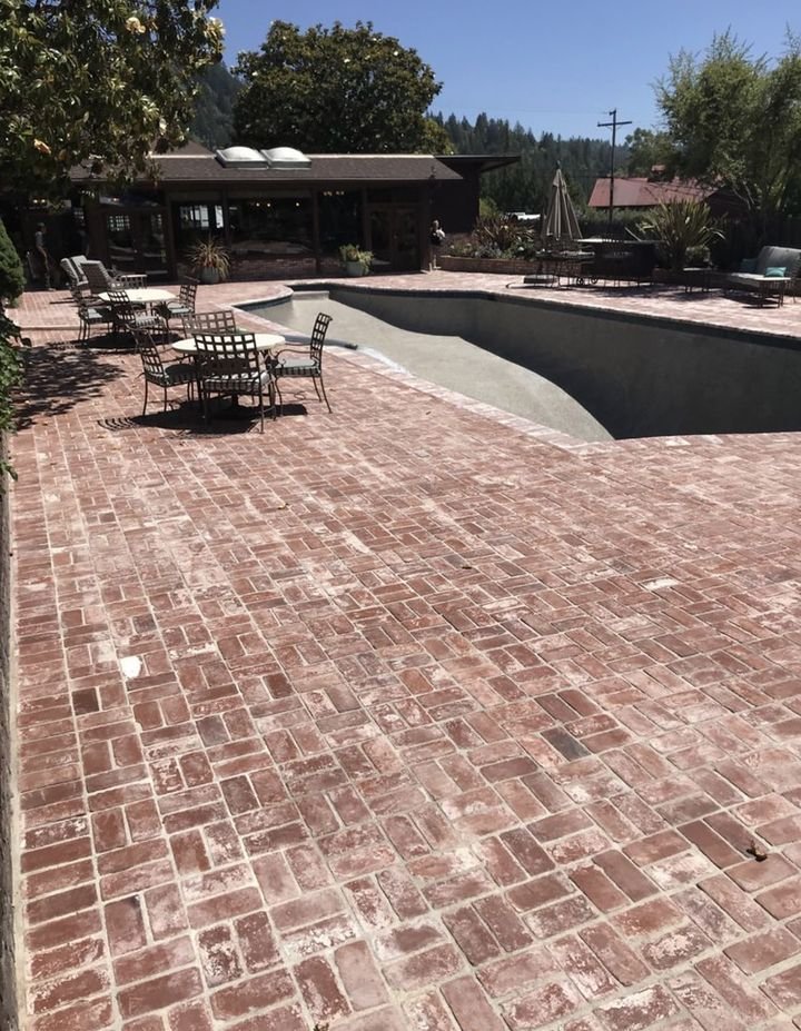 Rebuilt pool deck finished in brick