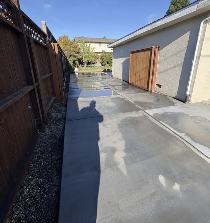 Freshly poured side-yard concrete slab